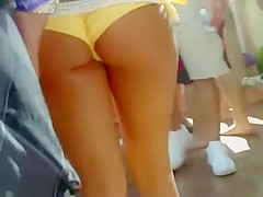 Perfect ass in a tiny bikini on a pool party