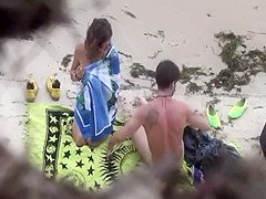 Voyeur catches wild sex on a beach