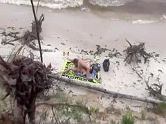 Voyeur catches wild sex on a beach