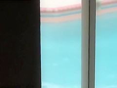 She reads a book and swims naked