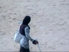 Couple making out on the beach