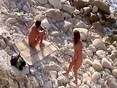 Wild fingering and a fuck on the beach