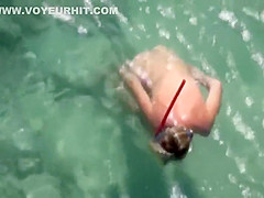 Naked diving girl spied by a voyeur