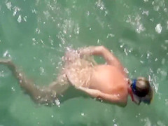 Naked diving girl spied by a voyeur