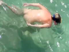 Naked diving girl spied by a voyeur