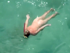 Naked diving girl spied by a voyeur