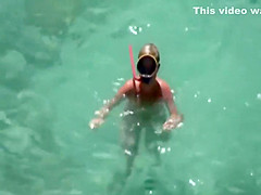Naked diving girl spied by a voyeur