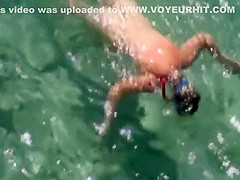 Naked diving girl spied by a voyeur