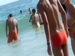 Irresistible asses of two girls at a beach
