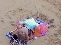 Sexy beach girl in wet crumpled bikini