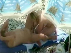 Sex under beach umbrellas