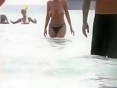 Big natural boobs got spied on a beach