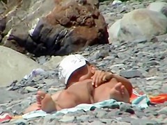 Guy reached for her ass while they tan