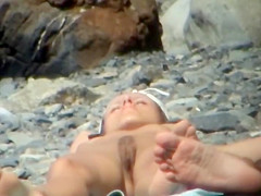 Guy reached for her ass while they tan