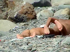 Guy reached for her ass while they tan