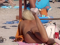 Well tanned and sexy nudist girl