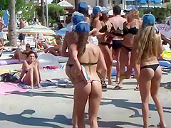Bar girls dancing on the beach