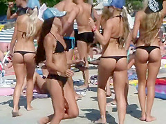 Bar girls dancing on the beach