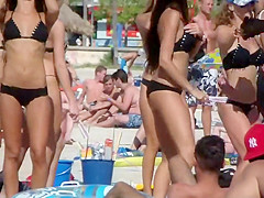 Bar girls dancing on the beach
