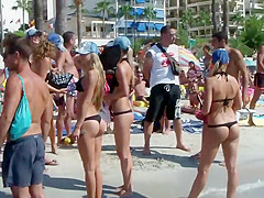 Bar girls dancing on the beach
