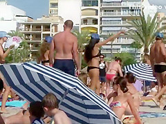 Bar girls dancing on the beach