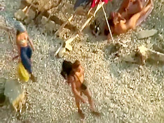 Beach blowjob with an audience