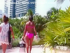 Checking out butts next to a beach