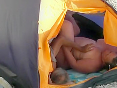 Fat woman fucked in the beach tent
