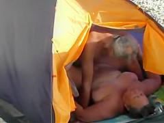 Fat woman fucked in the beach tent