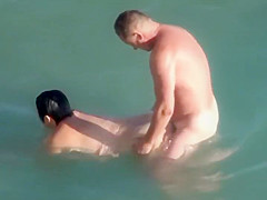 Wave knocks her off his penis
