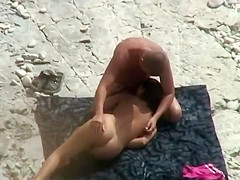 Lucky guy got a blowjob at the beach