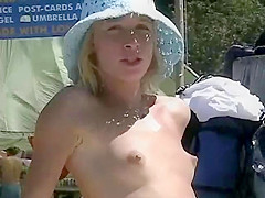 Bunch of nudists at a beach