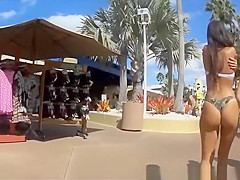 Two chicks with nice asses walking
