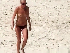 Blonde woman topless with small boobs