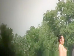 Voyeur at nudist beach films men and women