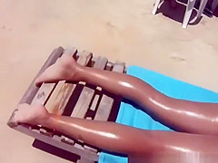 Hot woman in small bikini at the beach