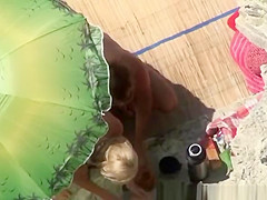 Chubby blonde nudist with her man