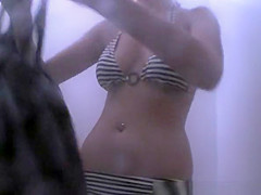 Girl in bikini caught showering and dressing