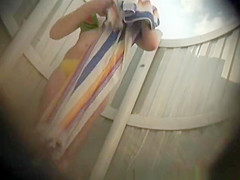 Teen caught in beach cabin drying