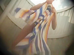 Teen caught in beach cabin drying