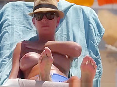 Nice tits blonde topless playing racket ball