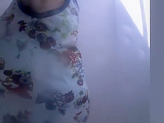 Chubby mature woman caught in beach cabin