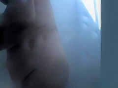 Chubby mature woman caught in beach cabin