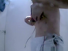 Woman changes in beach cabin