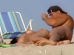 Flirt on a Nudist Beach