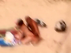 Ass grinding and fucking on a beach