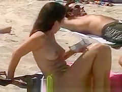 Topless beach babes