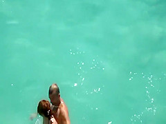 He teaches her how to swim