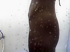 Tan Lines in beach cabin shower