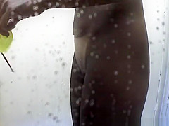 Tan Lines in beach cabin shower